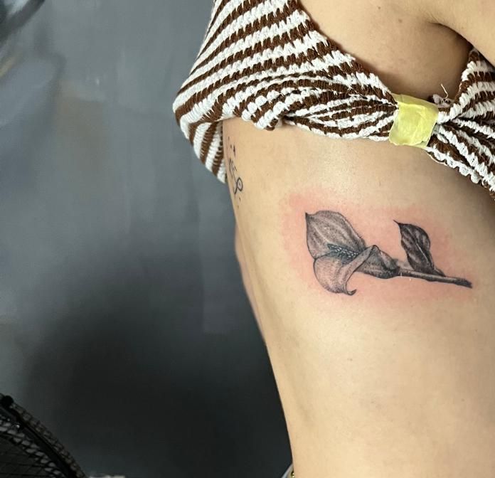 Soft black and grey calla lily on the ribs