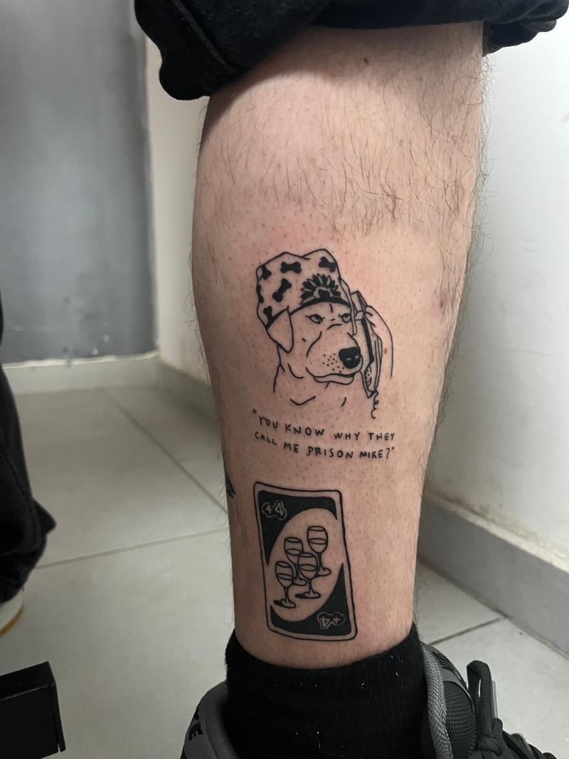 Fine line calf piece: a dog in a bandana with hand-lettered text, above an Uno card