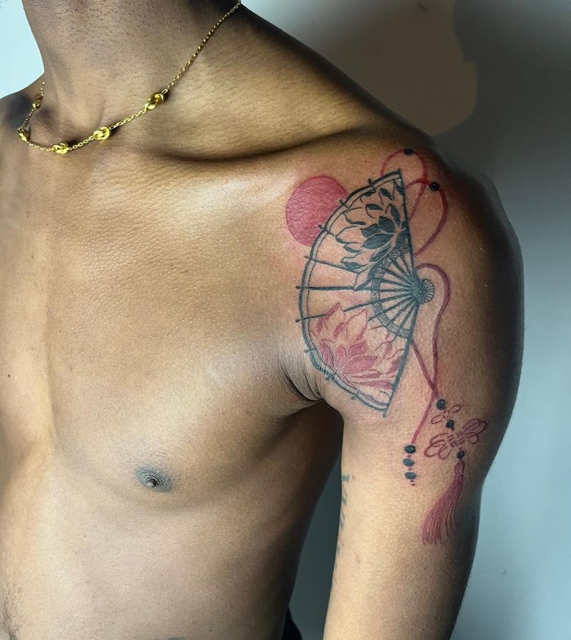Full colour shoulder piece: a folding fan with a lotus, red sun and tassel
